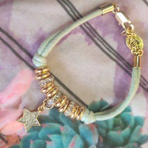 Juicy Couture Silver Bangle w/ Star, Gold hue, and Sparkle Beads